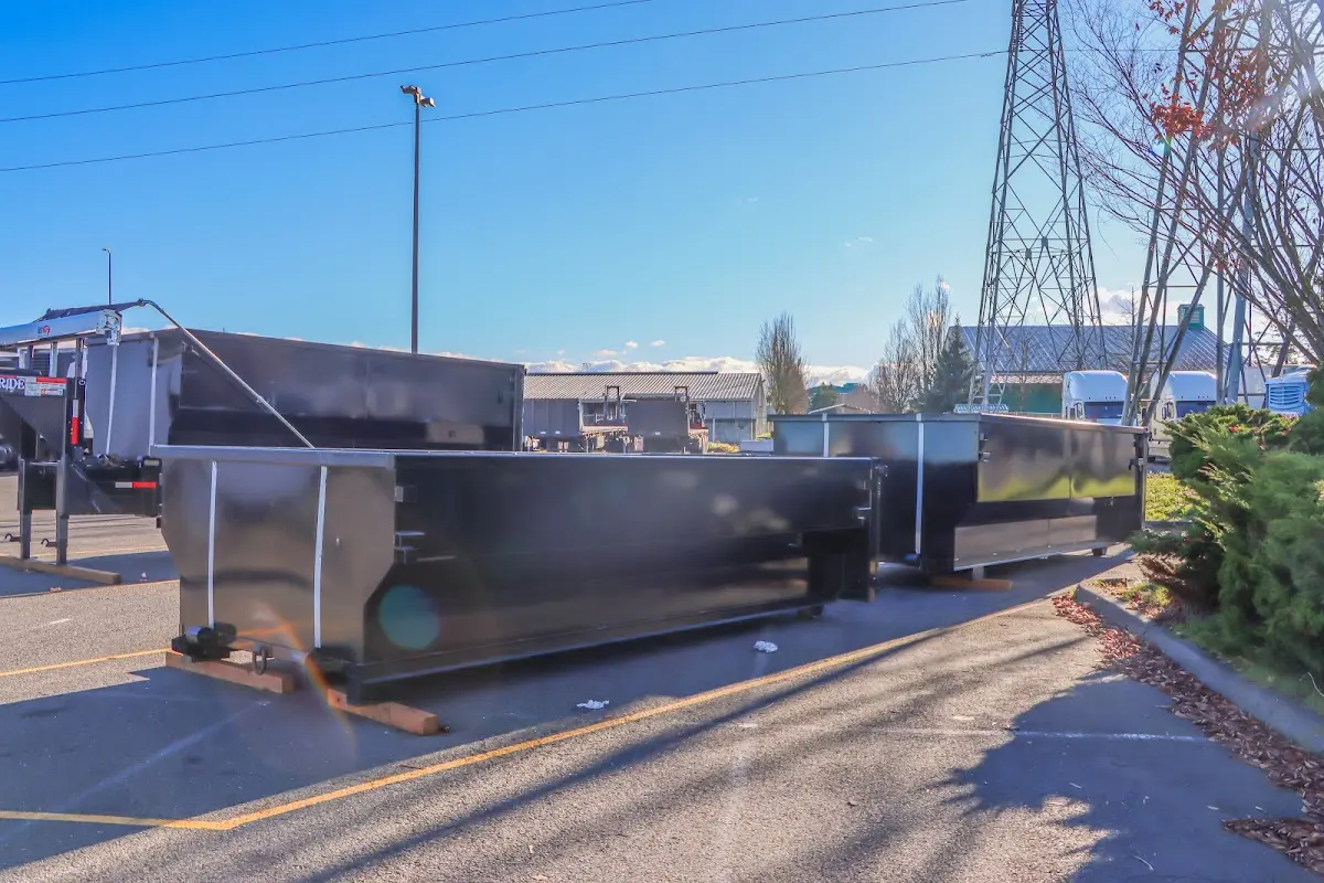 Roll-off dumpster ready for waste disposal at job site for Commercial Dumpster Rental in McKenzie